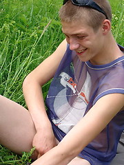 Naughty outdoor enthusiast Hubert playing with his cock on a green meadow