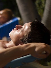 Super sexy twink Kyler Ash is laying out by the pool when out comes toned jock Evan Parker